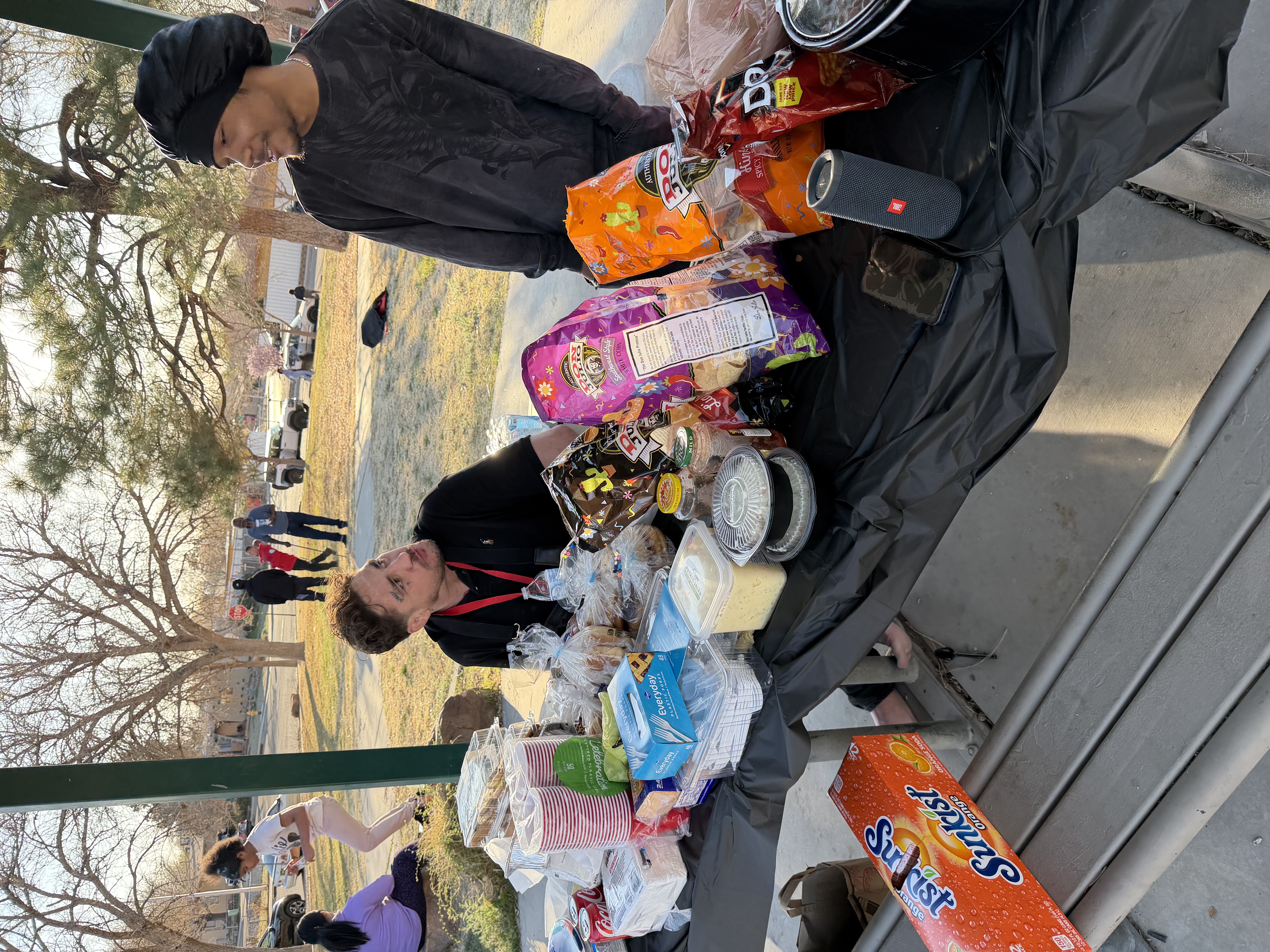 Community volunteers preparing food at the park